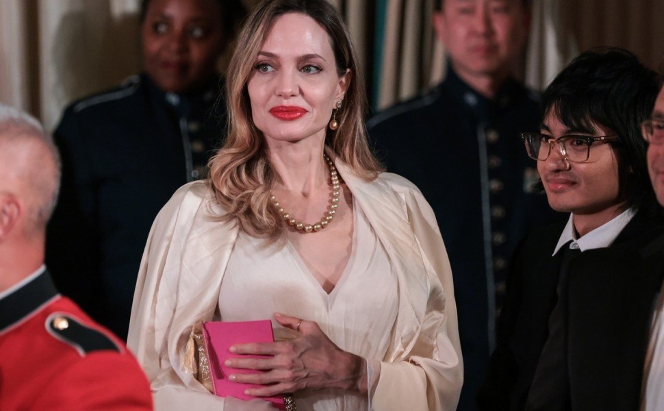 epa10593756 US Actor Angelina Jolie and her son Maddox Jolie-Pitt speak to guests during the State Dinner for South Korean President Yoon Suk-yeol of the Republic of Korea hosted by US President Joe Biden held in the East Room of the White House in Washin