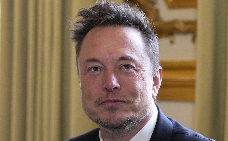 epa10629001 Twitter, now X. Corp, and Tesla CEO Elon Musk poses prior to his talks with French President Emmanuel Macron (not in picture), at the Elysee Palace in Paris, 15 May 2023. More than 200 international business leaders are expected 15 May to atte