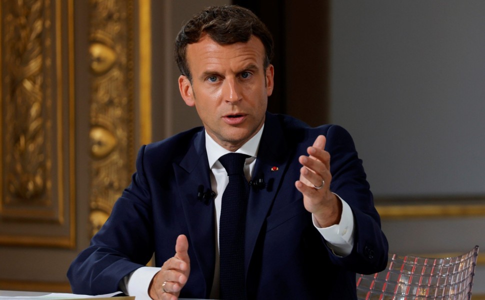 French President Emmanuel Macron gestures as he speaks during a news conference ahead of the G7 Summit, at the Elysee Palace in Paris, France, June 10, 2021. REUTERS/Pascal Rossignol/Pool French President Emmanuel Macron gestures as he speaks during a news conference ahead of the G7 Summit, at the Elysee Palace in Paris, France, June 10, 2021. REUTERS/Pascal Rossignol/Pool