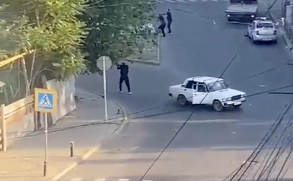 Eyewitness video shows shooting on street in Makhachkala/Reuters