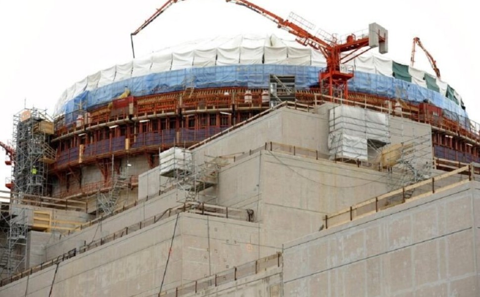 In this March 23, 2011 photo,the nuclear power plant Olkiluoto 3 'OL3' is pictured under construction in Eurajoki, south-western Finland. Halfway around the globe from Japan's atomic emergency, engineers building a cutting-edge nuclear reactor along Finla