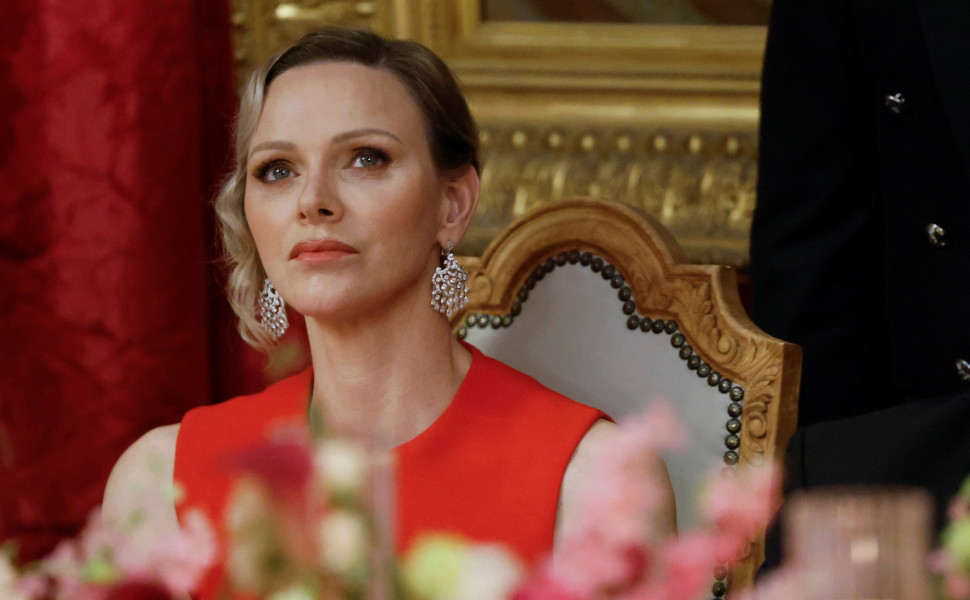 Princess Charlene of Monaco listens to speeches at the Prince's Palace - Φωτογραφία αρχείου Reuters