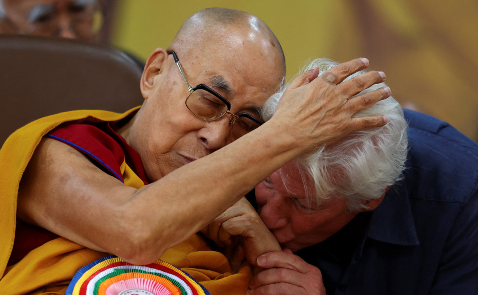 Actor Richard Gere kisses the hand of Tibetan spiritual leader, the 14th Dalai Lama, during his 90th birthday celebration at the Tsuglagkhang, also known as the Dalai Lama Temple complex, in the northern town of Dharamshala, India, July 6, 2025. REUTERS/A